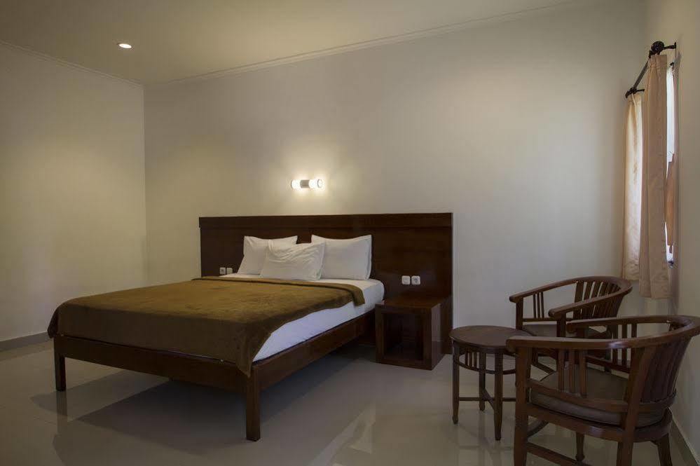 Budhi Beach Inn Кута Экстерьер фото